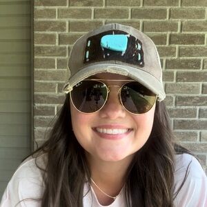 Trucker style hat with turquoise jewel